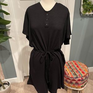 Black romper with drawstring waist. NWT, Size L.